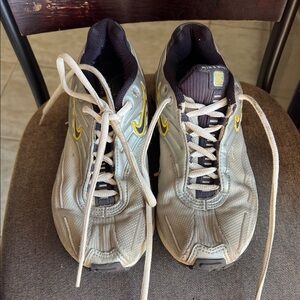 Vintage Nike Gray Athletic Sneakers with Yellow Swoosh